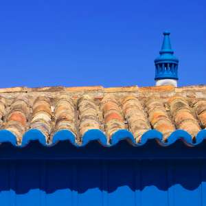 Tiled Roof on Blue Wallpaper