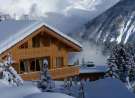 Wood chalet in winter wallpaper